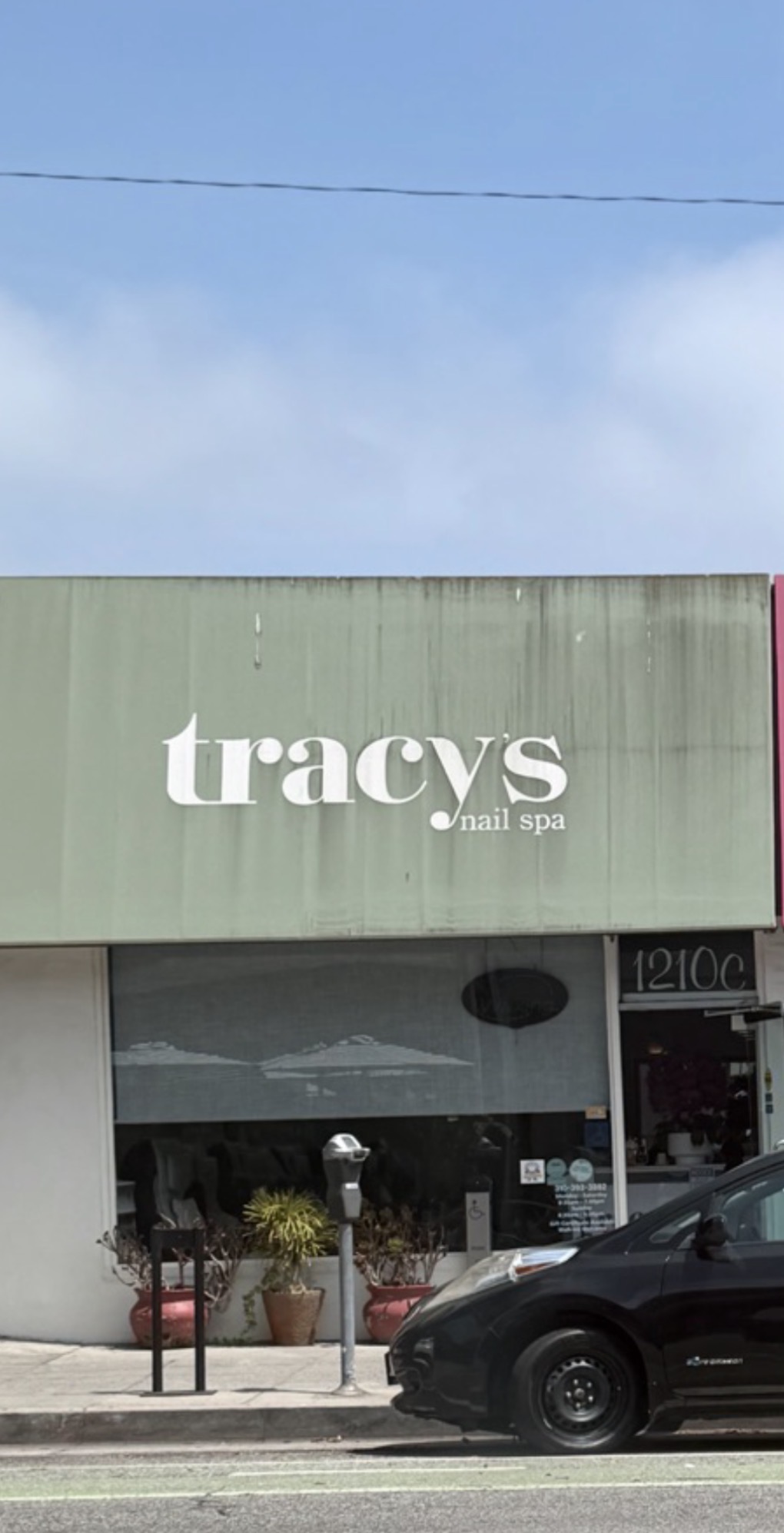 Tracy's Nail Spa storefront before cleaning